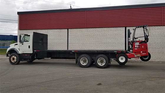 Moffett M8 55.3-10 NX Forklift and International Truck for Sale