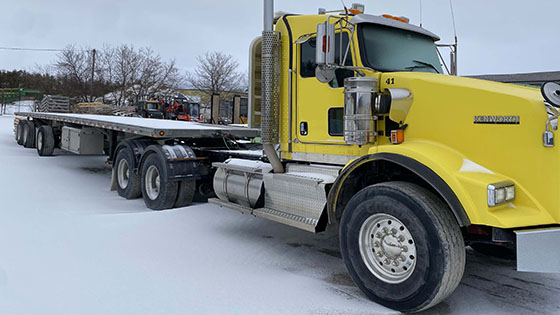 Kenworth Tractor and Galvanized Steel Moffett Trailer - SOLD