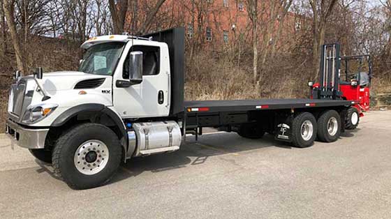 Moffett M8 55.3-10 NX Forklift and International Truck - SOLD