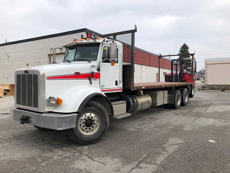 Moffett M8 55.3-12 Forklift and Peterbilt 365 Truck for Sale